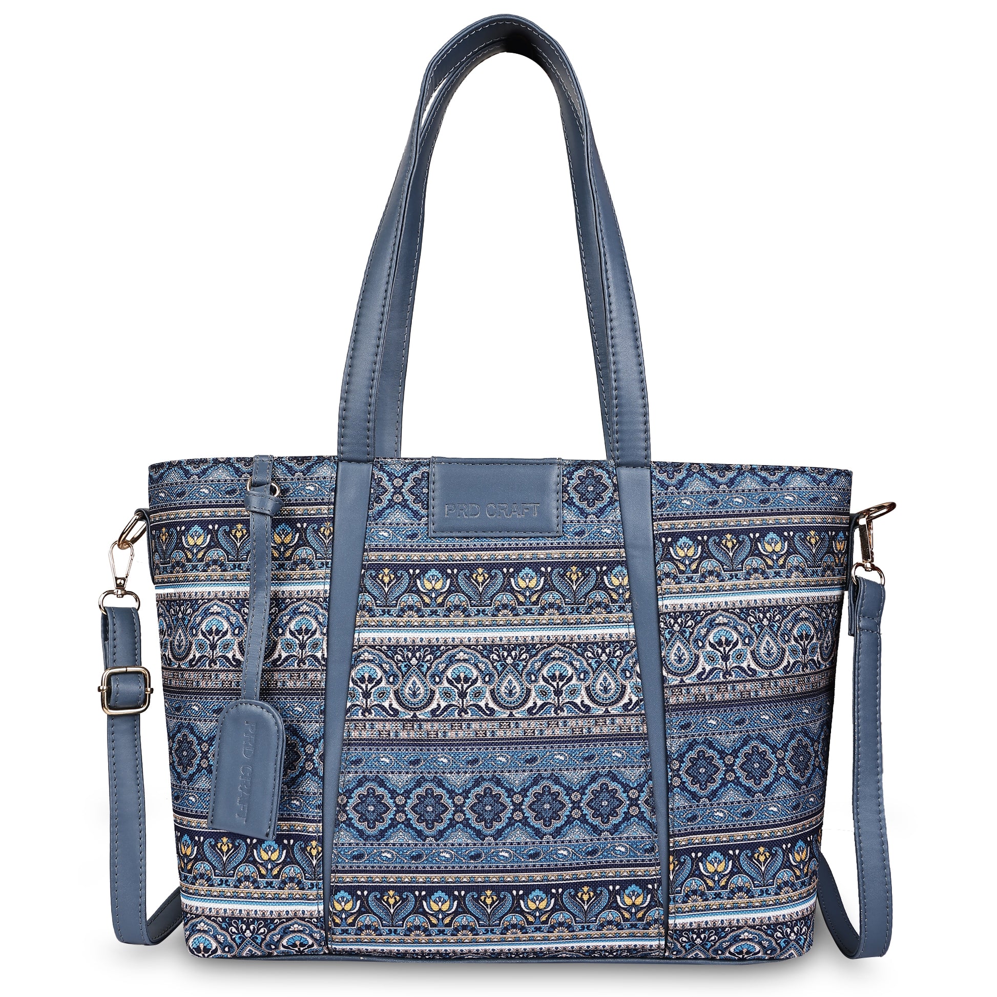 Blue patterned handbag with matching wallet on a white background